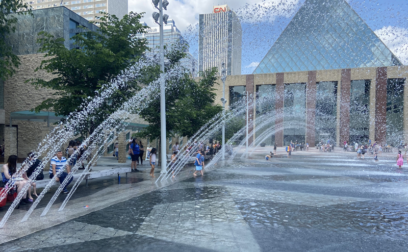 Kids and families playing in City Hall Fountain