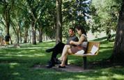 Photo of people on park bench