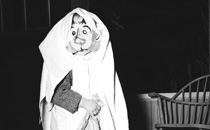 Child in a ghost costume.