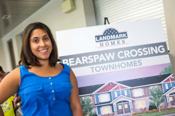 Alisha was first in line to choose her First Place home in Bearspaw Crossing
