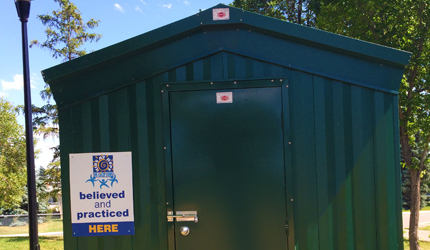 Kids at Hope sign on a Green Shack in an Edmonton park