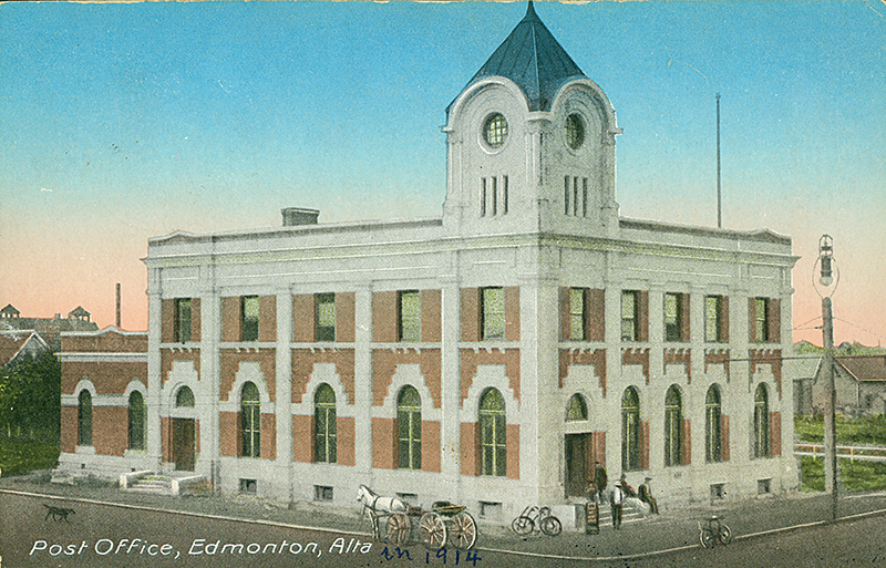 A realistic drawing of a rectangular two storey brick building with a tower on it's right side.