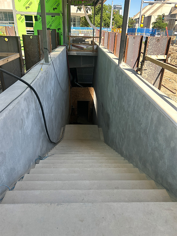Concrete stairs being constructed to new pedway