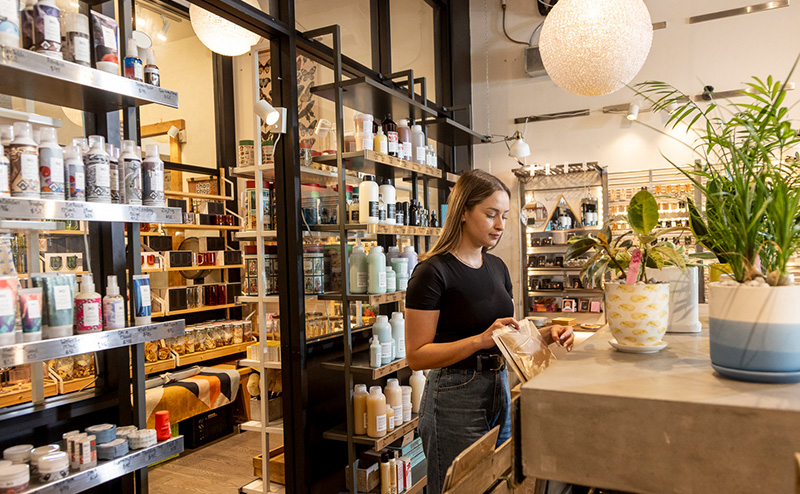 A person looks through items at a local store in Edmonton