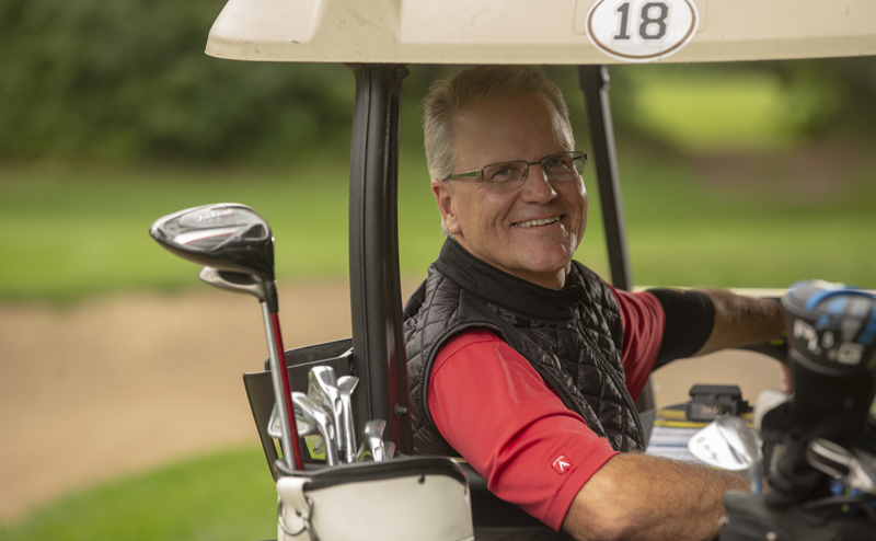 Man in a golf cart