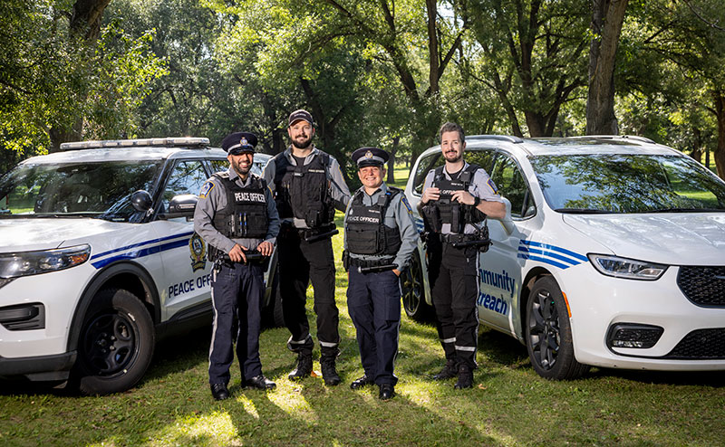 3 peace officers standing in uniform
