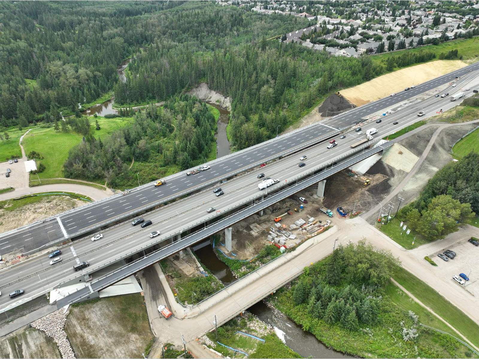 Aerial view of Whitemud Drive/Terwillegar Drive interchange showing  4 lanes in each direction