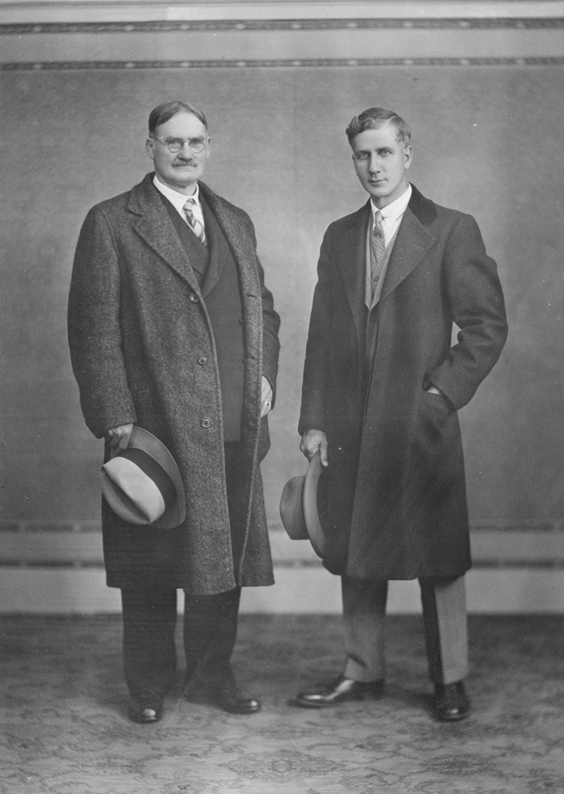 Black and white photo of James Naismith and Percy Page.