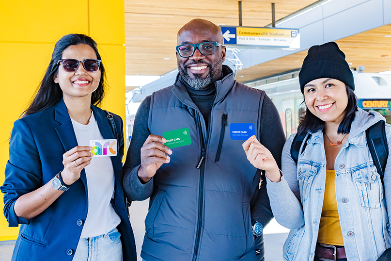 Arc Tap to Pay banner featuring riders holding up various payment methods