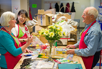 Happy volunteers working at the Reuse Centre