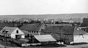 Various historical wood buildings, which became later became buildings in Fort Edmonton Park