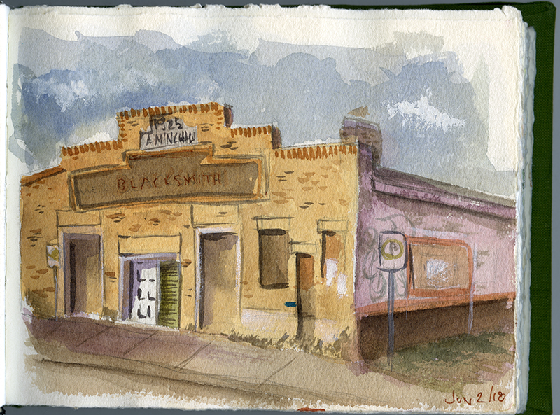 A sketch of a yellow-beige brick building