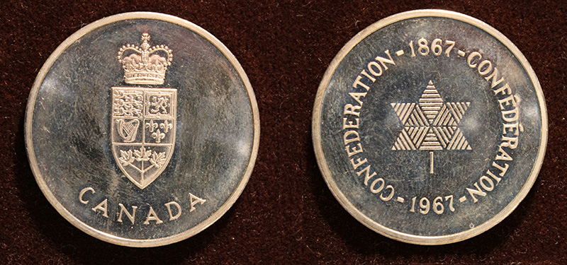 Photo of the front and back of an official Centennial Medallion.