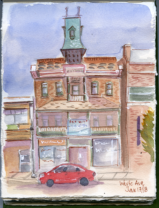 A sketch of the exterior of a two storey brick hotel