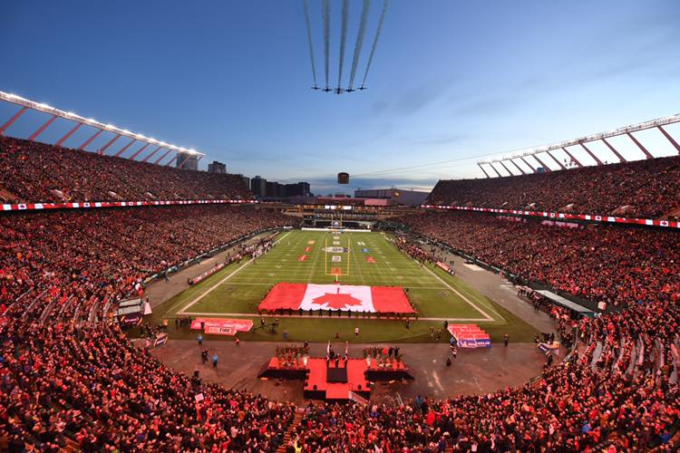 The Snowbirds fly over the Grey Cup celebration.