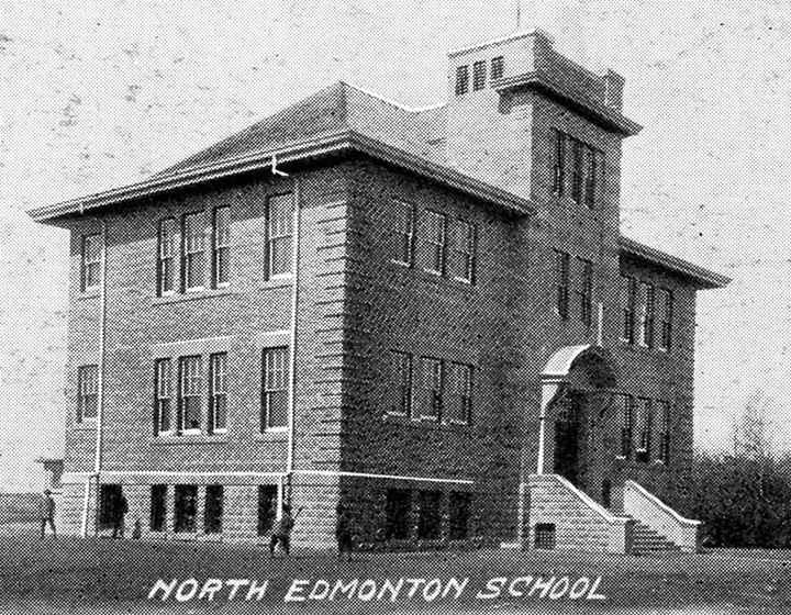 Black and white photo. A large multi-story school building. A single entrance with a stairway is visible. A small group of people are standing on the left side of the school. Text overlaid on the bottom of the photo reads "North Edmonton School".