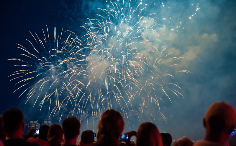 People watching a fireworks display.