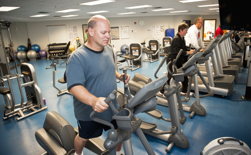 A man using exercise equipment at Central Lions.