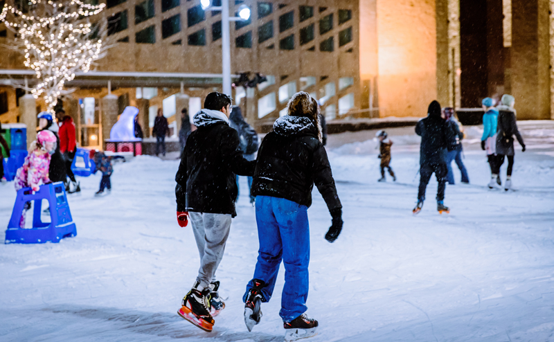 People skating in Churchill Square.