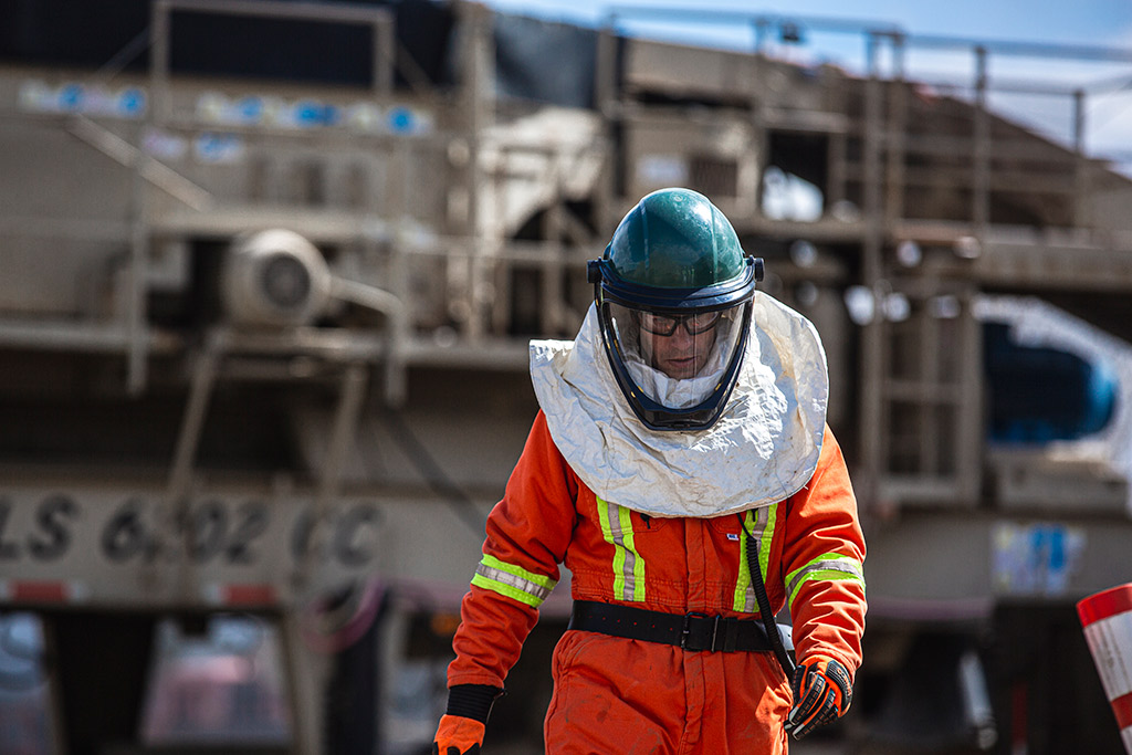 Equipment operator wearing PPE