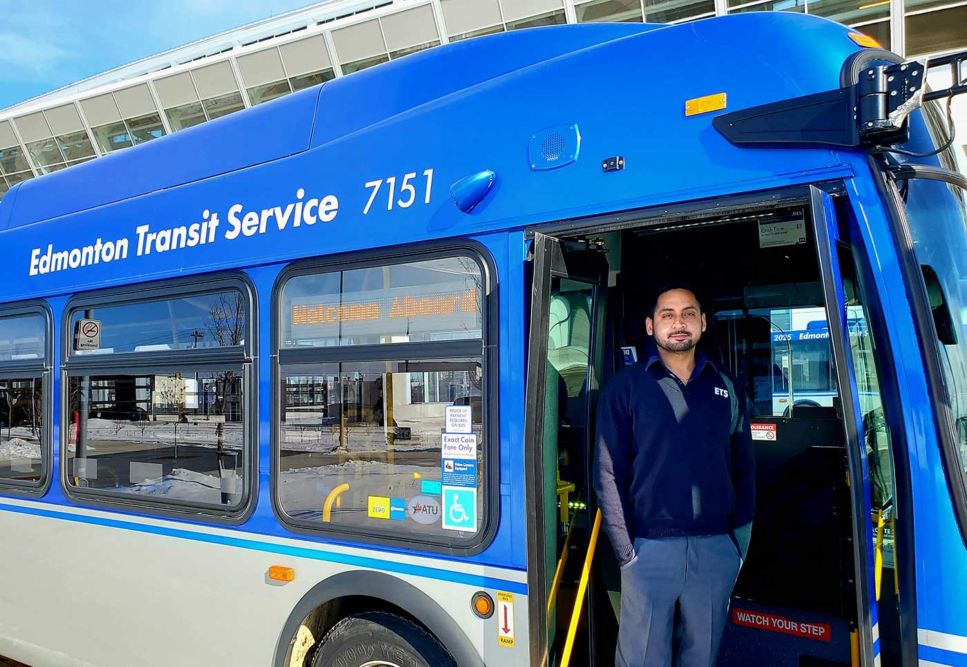 Singh in the front of an ETS bus. His advice to his own children, "If you are ever scared or alone, go find a bus driver."