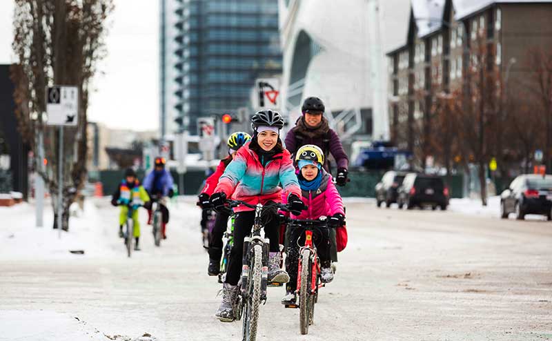 Family cycling in winter