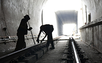 Maintenance workers working on the rail line