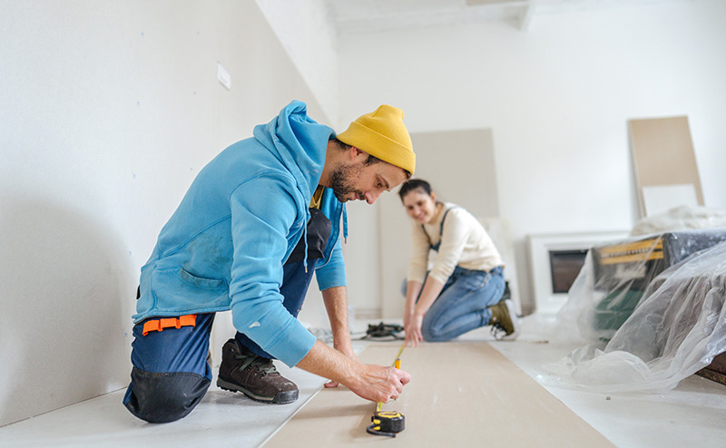 Couple work together on home renovations