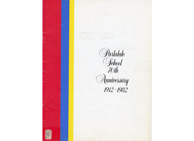 The cover of a white book with black text and a red, blue and yellow stripe on the spine