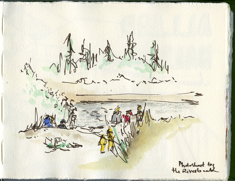 A sketch of people in a lake or on the shore, surrounded by a forest.