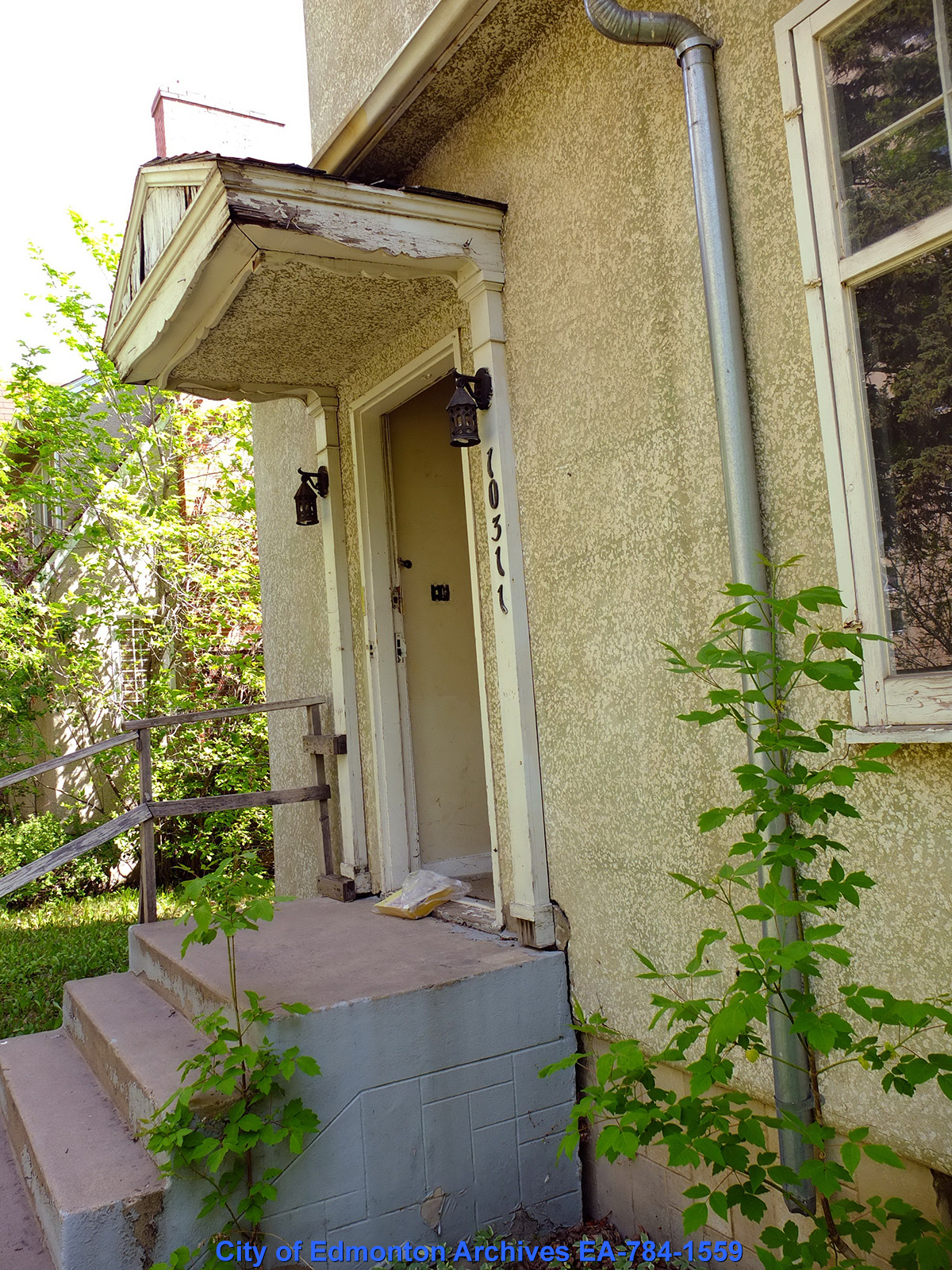 The open doorway of an Edmonton townhouse. 