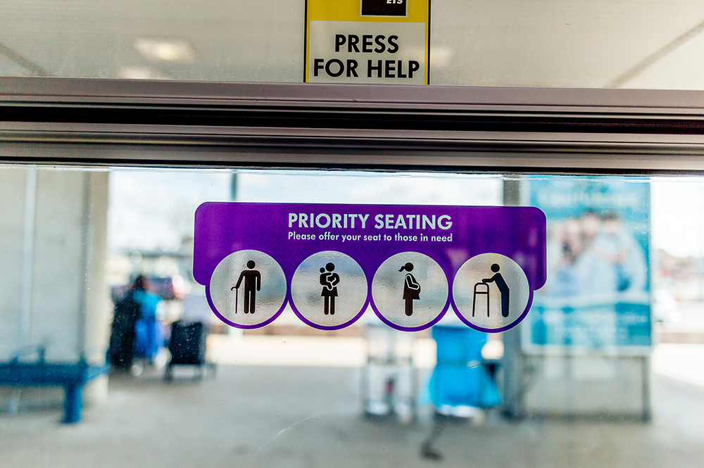Photo of priority seating sticker on window