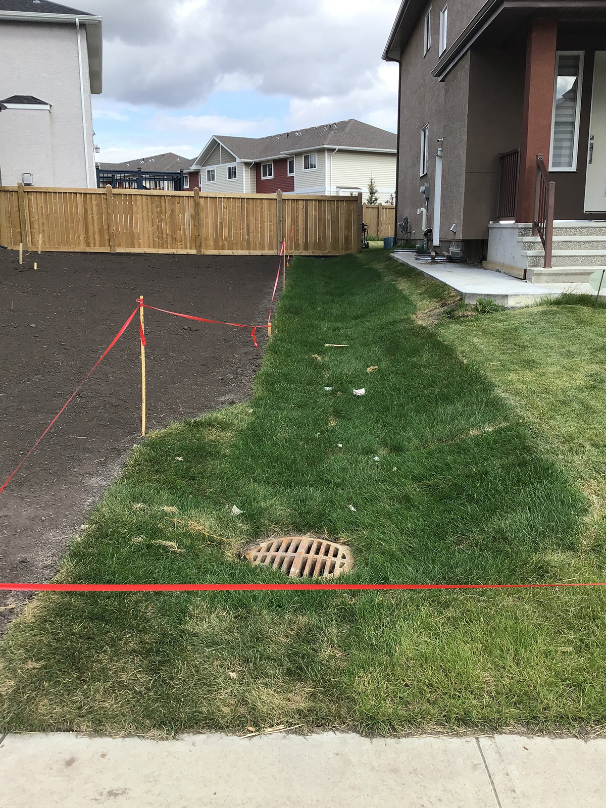 Grass Swale in Drainage Easement with catch basin