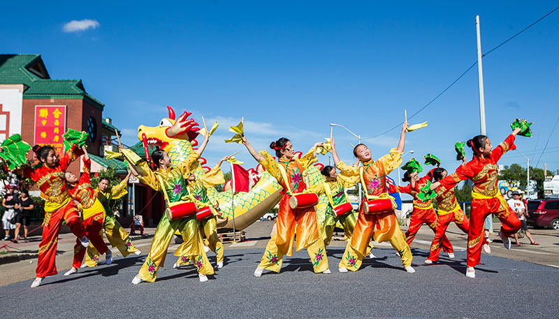 People participating in a dragon parade