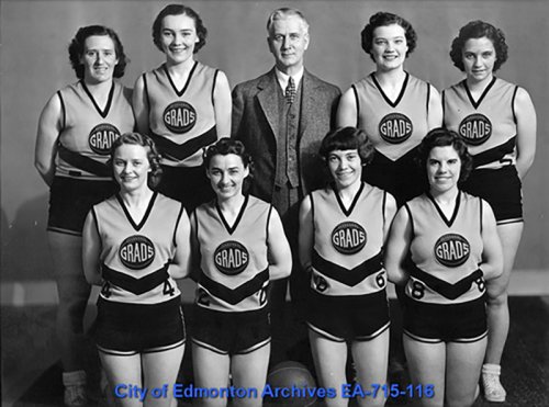 team photo with 8 women and one man