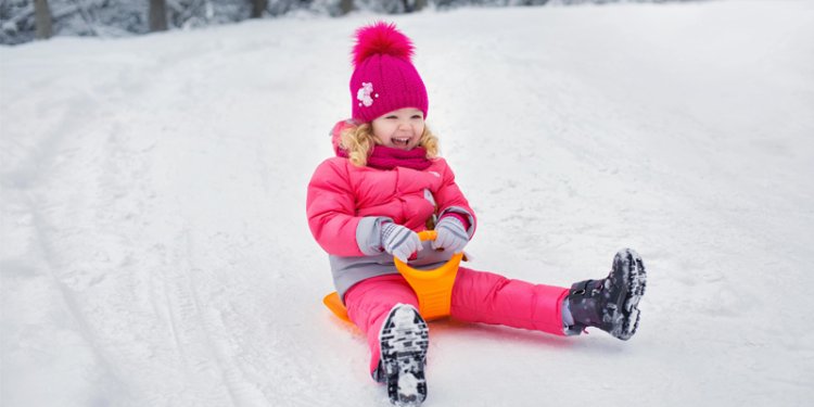 kid on toboggan