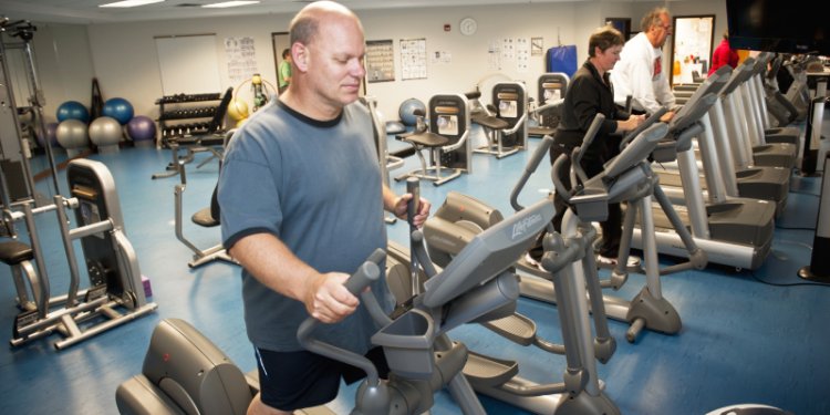 A man using exercise equipment at Central Lions.