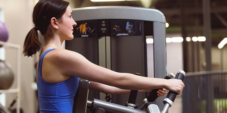 person using gym equipment