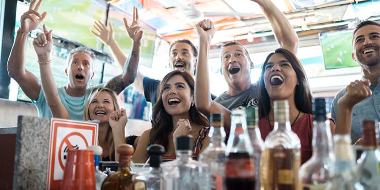 excited people in bar