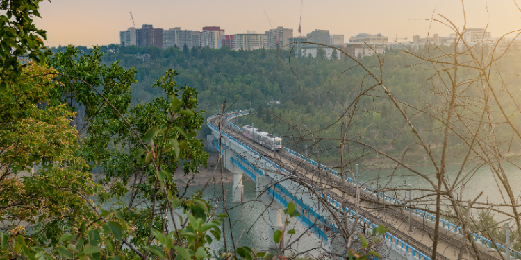 LRT going over river valley bridge