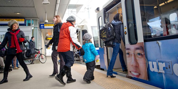 People getting on a bus
