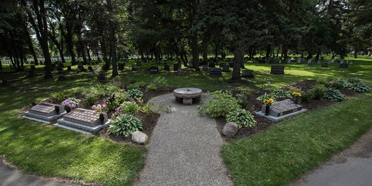 cemetery garden with plaques in ground