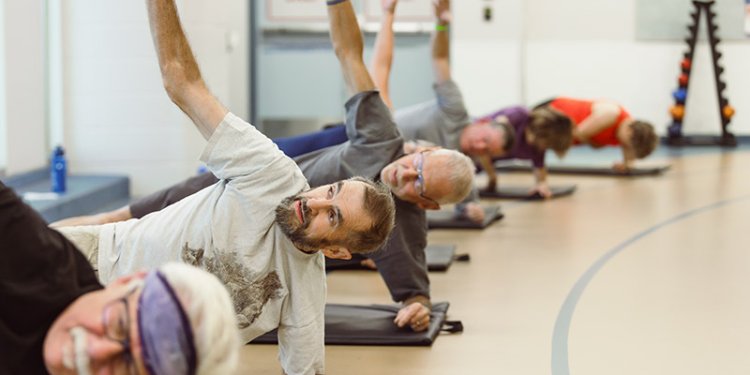 seniors exercising in gym