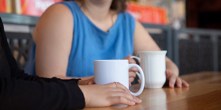 persons using ceramic cups