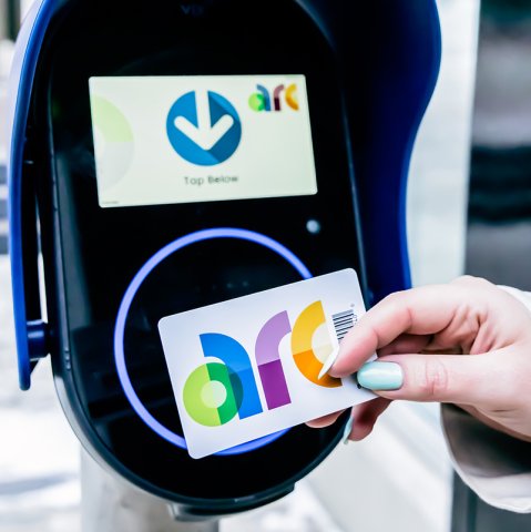 Arc card tapped against an arc validator on a bus