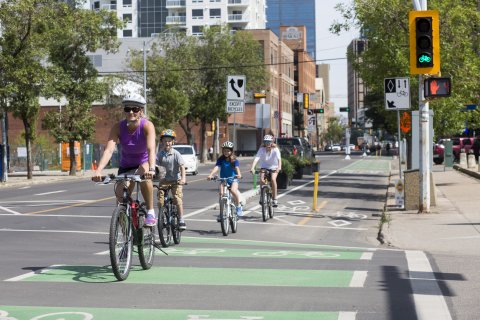 Cyclists riding on downtown bike route