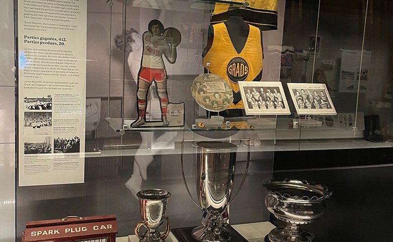 Glass case of Edmonton Grads memorabillia