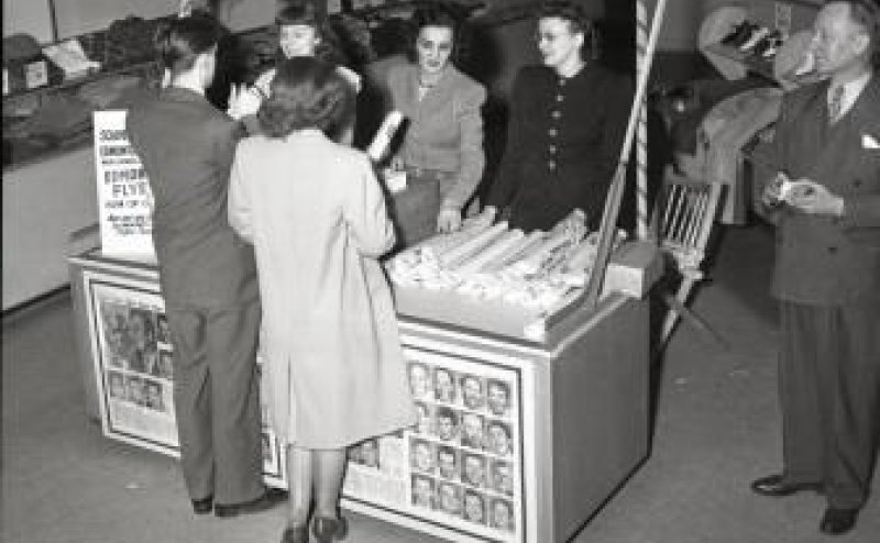 Women handing out souvenirs