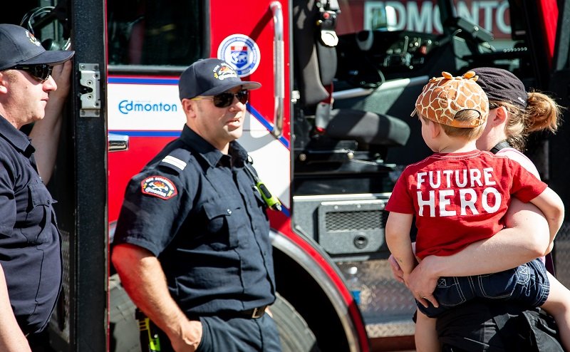 view of emergency vehicles from above
