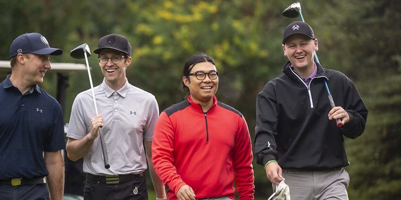 Group of men golfing